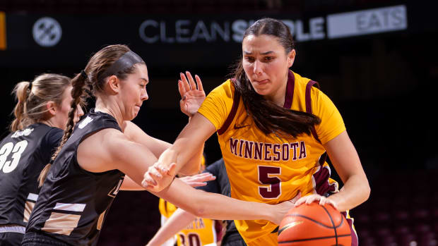 Maggie Cziano dribbles
